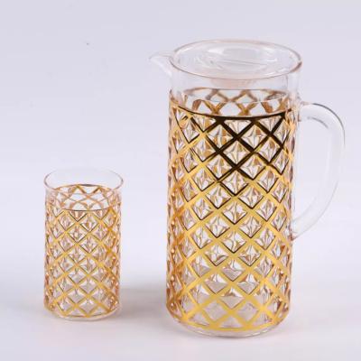 Carafe en plastique + 6 verres dorée