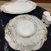 Service de table en porcelaine 28 pièces marbre doré